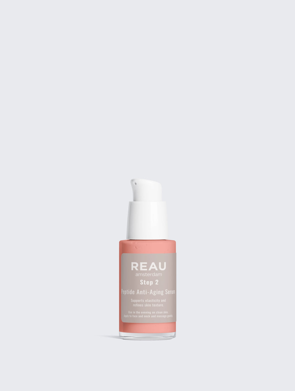 Skincare serum bottle with a white pump on a light gray background